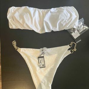 Brand new Bikini from Garage, 
Top is medium bottom is small